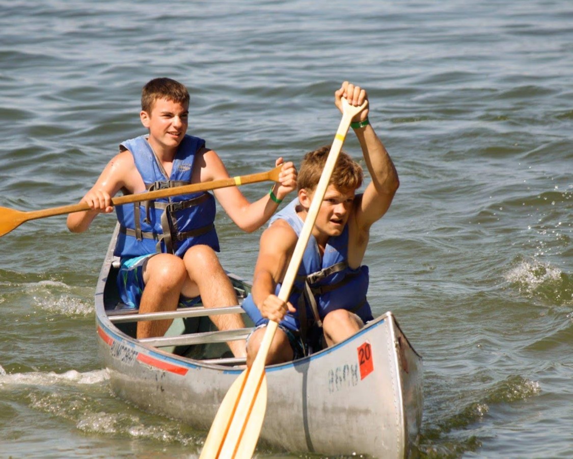 Two Scouts canoeing in the lake